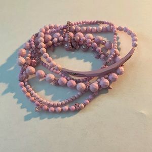 Kendra Scott purple bracelets